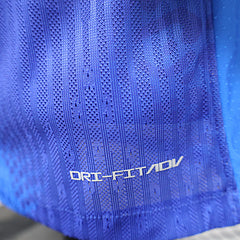 Maillot Brésil Extérieur – Édition Spéciale Patchwork Bleu & Vert Fluo